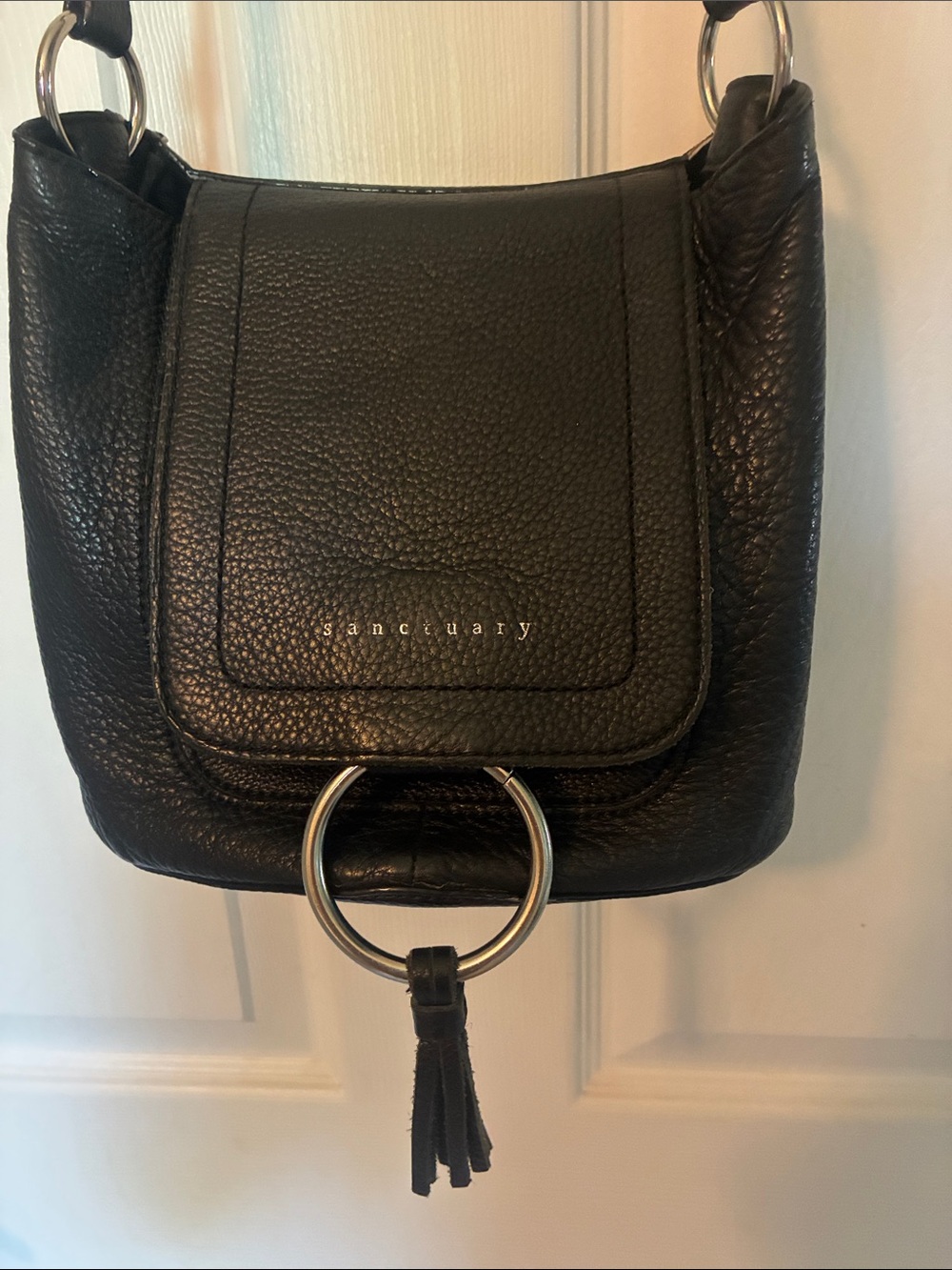 Sanctuary Black Pebbled Leather Crossbody Bag with Ring Tassel Accent